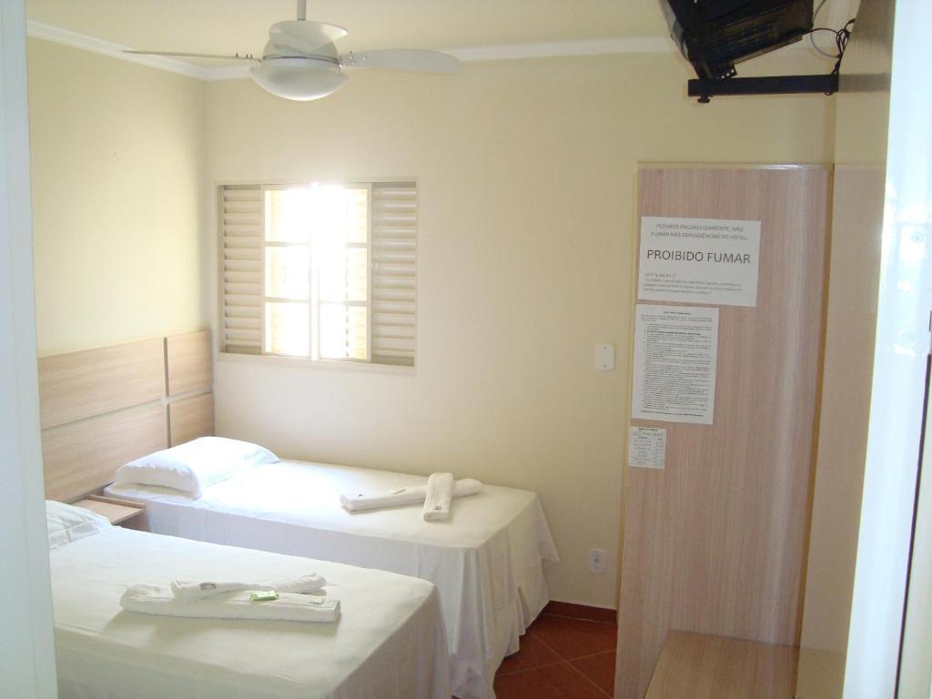Hotel Perez Pouso Alegre Cameră foto